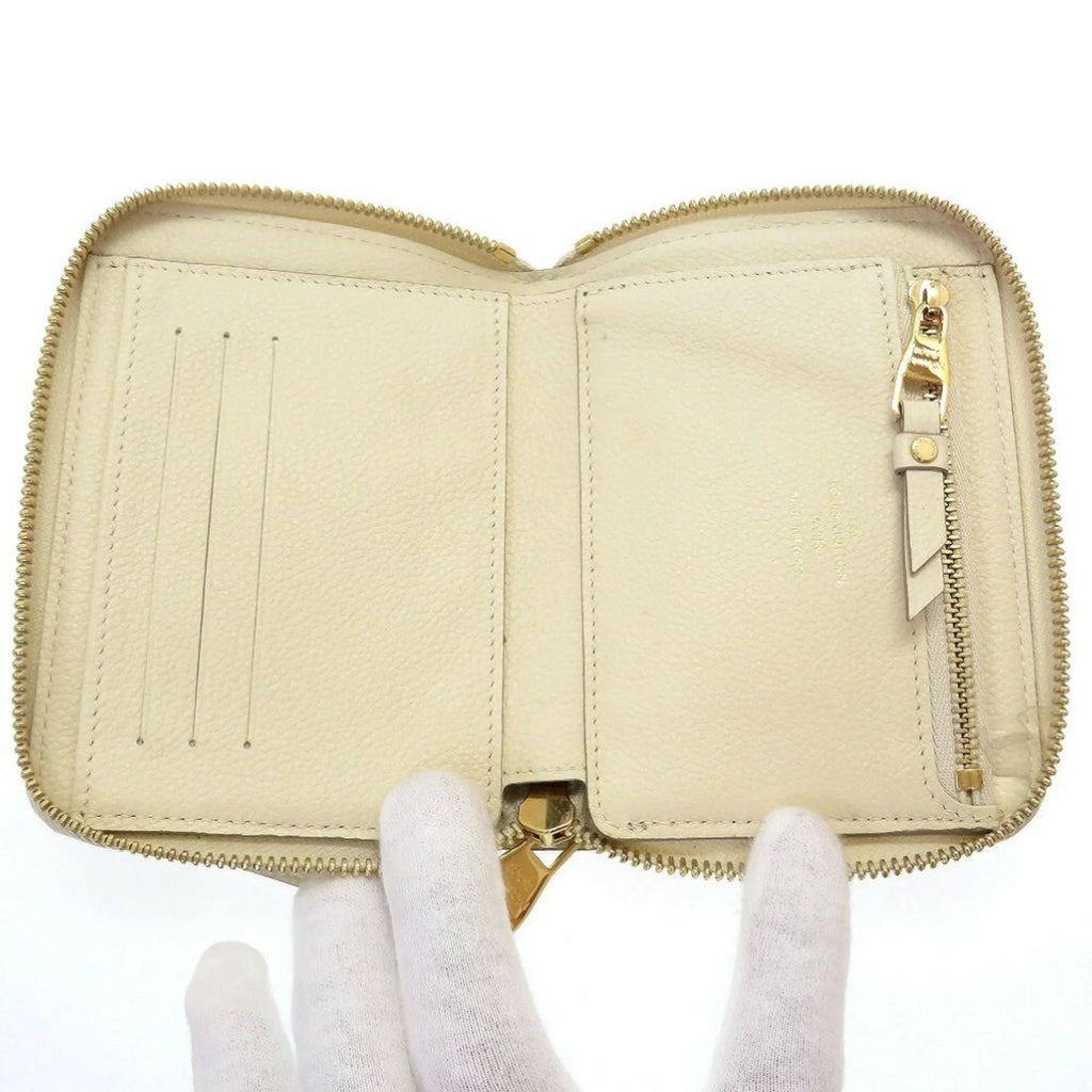 Portefeuille M93432 Neige Wallet (Good) Bifold Pre-Owned Round Secret Monogram Implant